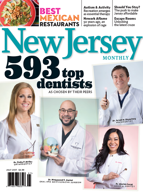 The image shows a cover of  New Jersey  magazine with the headline  693 Top Dentists  prominently displayed, featuring a collage of four individuals who appear to be dentists, each holding an object related to dental care, against a background that includes text and logos.