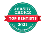 The image features a circular badge with a white border, containing text and graphics. It has a green background with a red ribbon at the top. On the left side of the badge, there's an illustration of a toothbrush and a tooth, symbolizing dentistry. The central text reads 'JERSEY CHOICE TOP DENTISTS' in bold, capital letters. Below this, in smaller font, it says '2021.' On the right side, there's a red ribbon with white text that states 'NEW JERSEY MONTHLY.' The badge also includes a circular stamp-like graphic on the left side, and a small emblem of a green seal. The overall style of the image is emblematic and award-like, suggesting recognition or endorsement for dental professionals in New Jersey.
