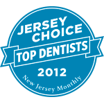 The image shows a blue badge with text that reads 'JERSEY CHOICE TOP DENTISTS 2012' and includes the New Jersey Monthly logo, indicating an award for top dentists in New Jersey for the year 2012.