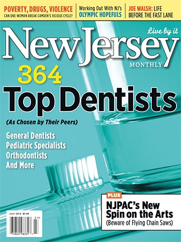 The image shows a magazine cover with text indicating  New Jersey  and  Top Dentists  along with various dental professionals  names, a glass vase, and other text including  364 ,  General Dentists ,  Pediatric Specialists , and more.