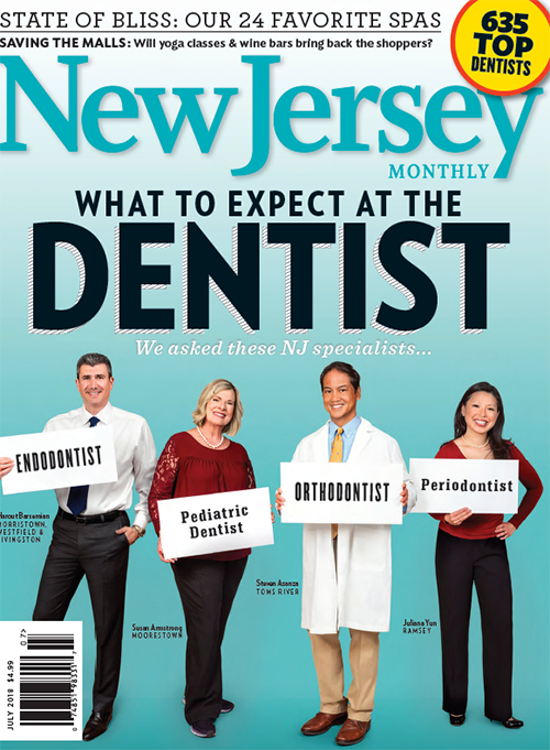 The image features a cover of  New Jersey Monthly  magazine with a headline about dentists, showcasing four people posing with signs related to dental professions.